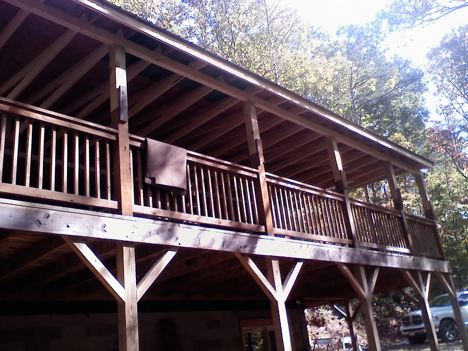 Timber framing under a new elevated porch and deck — Roof Leak Repair in East Brunswick by Roofing Brothers